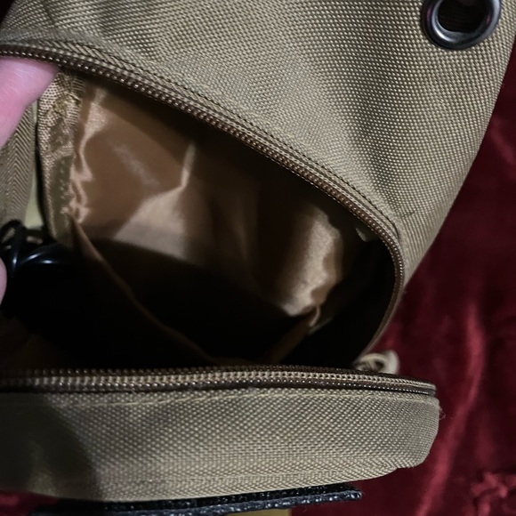 This is an over the shoulder bag… With a great patch on it. Used it once - Picture 3 of 5